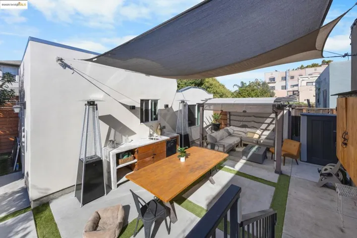View of patio with an outdoor living space and outdoor dining area