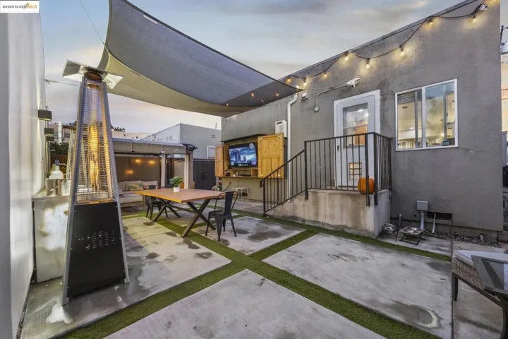 View backyard featuring outdoor dining space