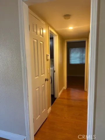 Hallway to Laundry Room, Downstairs Bedroom with 3/4 Bath