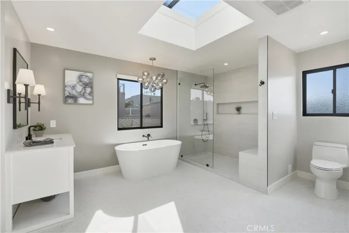 Gorgeous finishes, oversized glass walk-in shower with bench