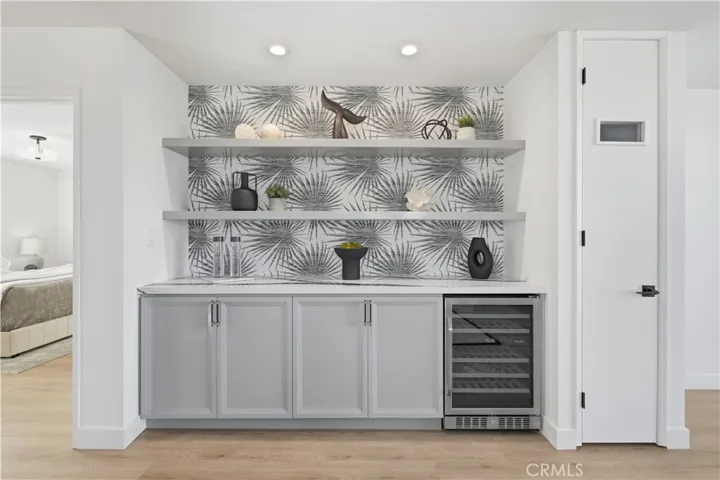 Dry bar and storage closet off dining room.