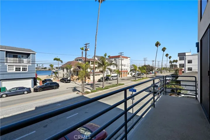 Living room balcony for enjoying bay views and the ocean breeze.