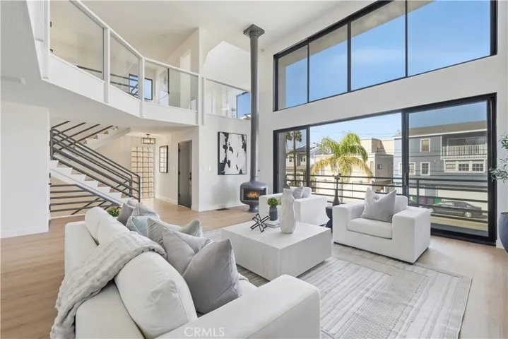 Fireside living room with balcony.