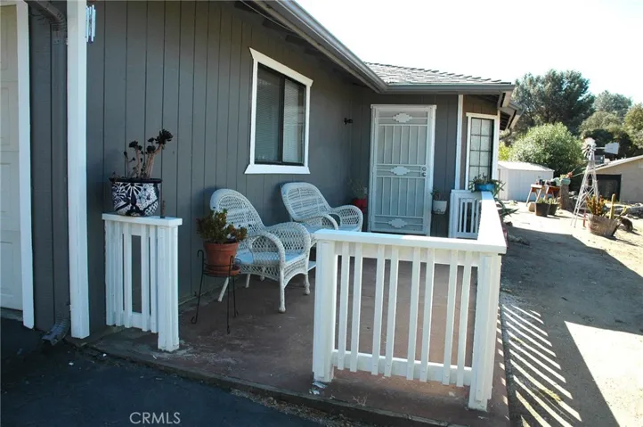 Nice cozy porch for your motning coffee,