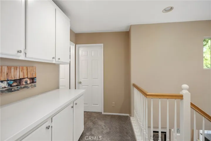 Upstairs linen closet and landing.
