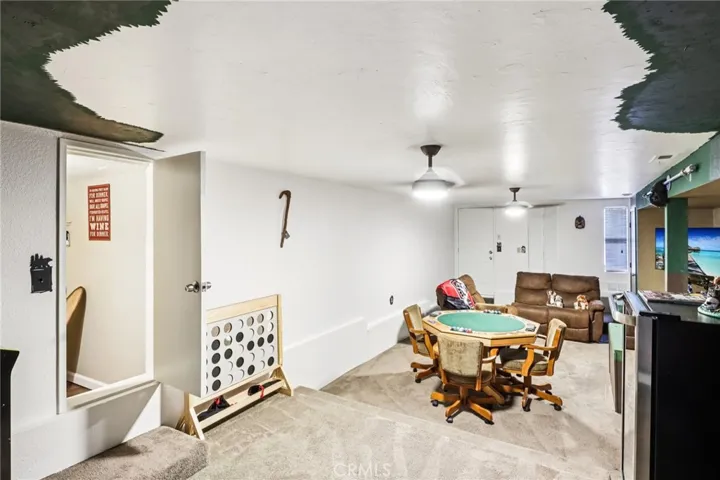Hidden 500-sq-ft bonus level—game area, lounge, and secret side room.
