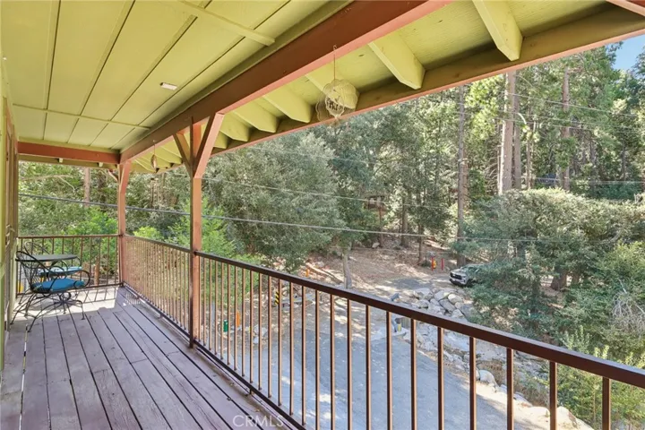 Covered upper deck with room for seating—relax in the treetops.
