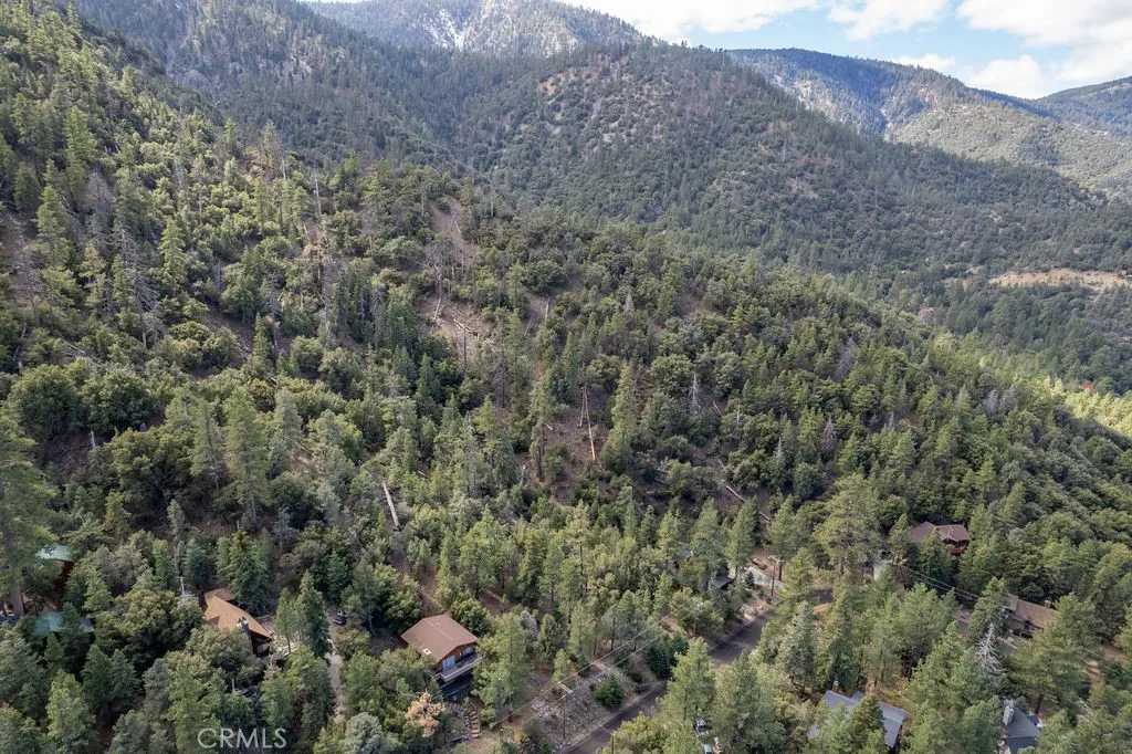 The lot is to the right of the house in the lower center of the photo.