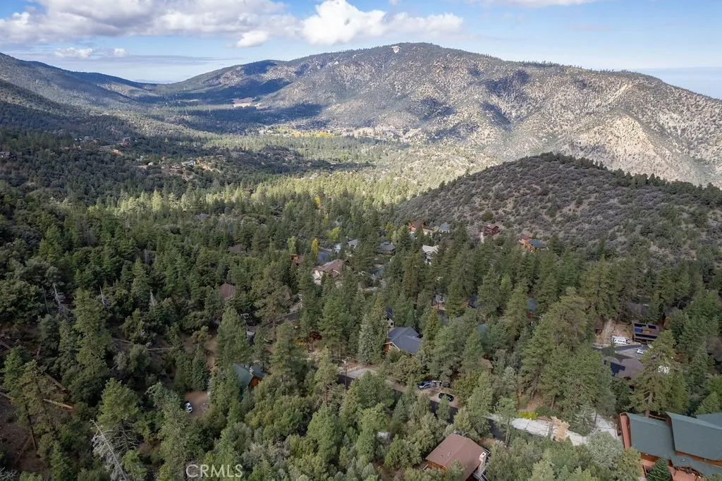 The lot is in the lower center to the left of the house.