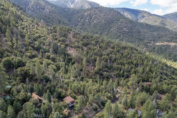 The lot is to the right of the house in the lower center of the photo.