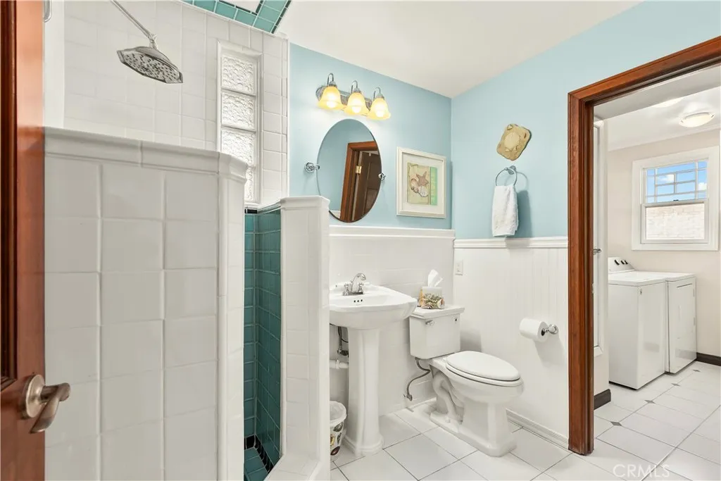Ole Hanson Doheny Tile Design with Separate Laundry Room