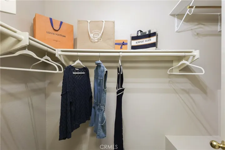 Walk-in closet that is waiting to be filled
