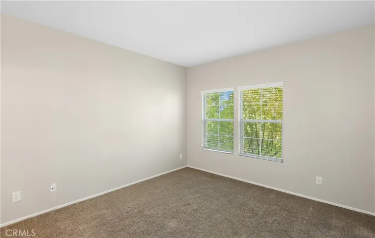 Primary bedroom with natural light
