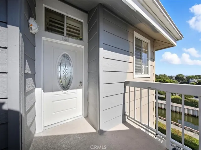 Enter through a beautifully leaded glass front door—this decorative feature balances privacy and natural light, elevating your entryway’s style.
