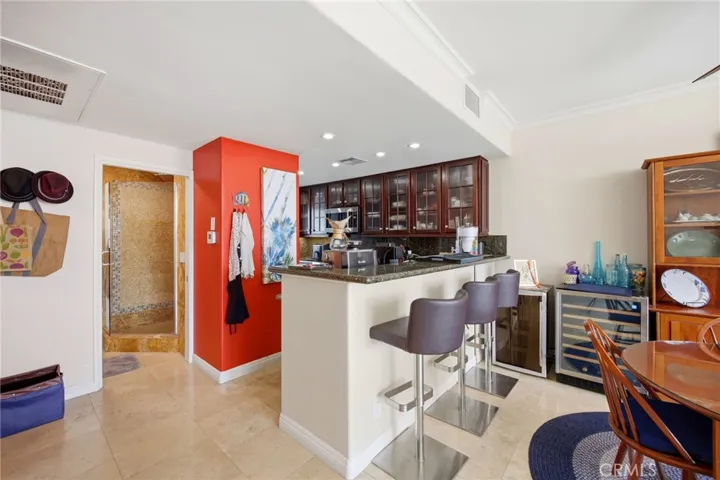 Dining area with convenient breakfast bar!