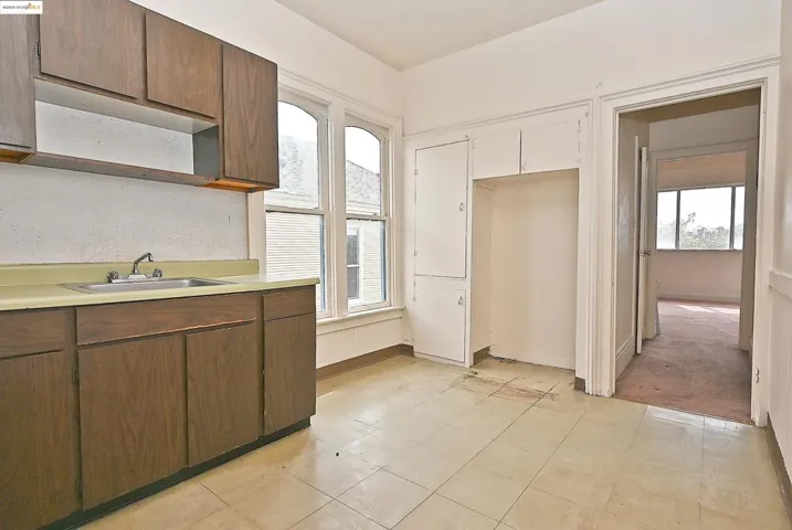 Kitchen with light countertops and plenty of natural light