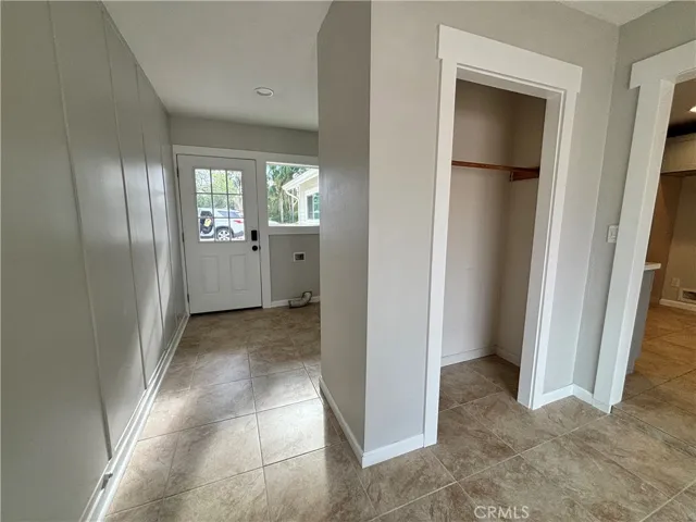 Main entrance and laundry area.