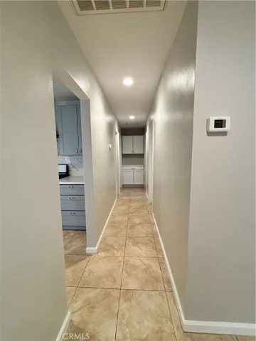 Hallway to bedrooms and bathroom.