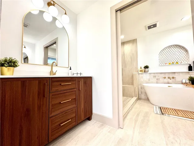 The Primary en suite with dual vanities