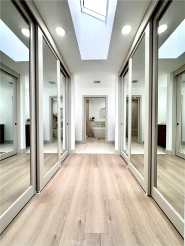 His/Hers/Theirs side by side closets with Tons of storage.
