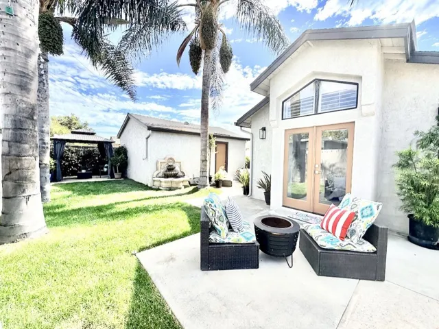 Delightful patio space off the Primary bedroom for morning coffee, or evening wine before getting in the hot tub