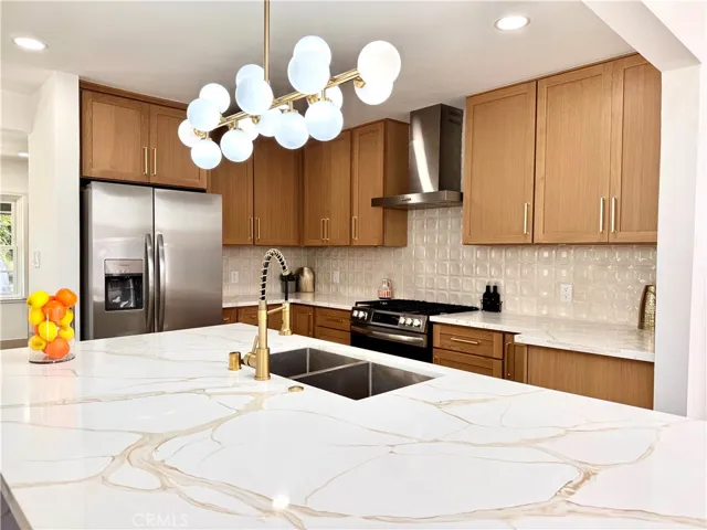Easy maintenance Quartz, and gorgeous chandelier