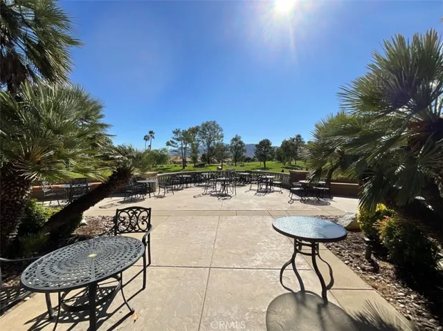Outdoor lounge area overlooking driving range