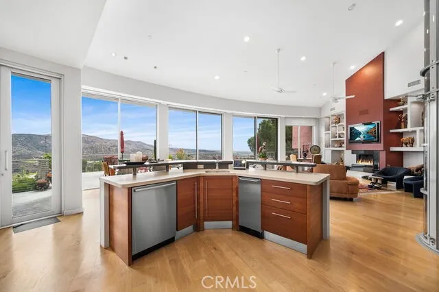 Views from secondary kitchen center island towards family room