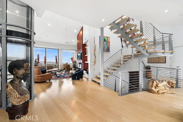 Open entry with staircases and elevator