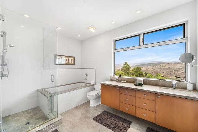 Bedroom 2 ensuite bathroom  unizue view window over the sink with side mirror