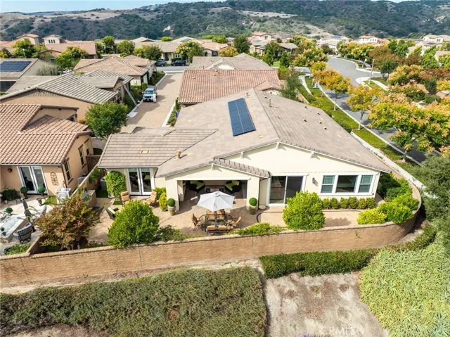 Bird’s eye view of the property and lush greenery around the residence.