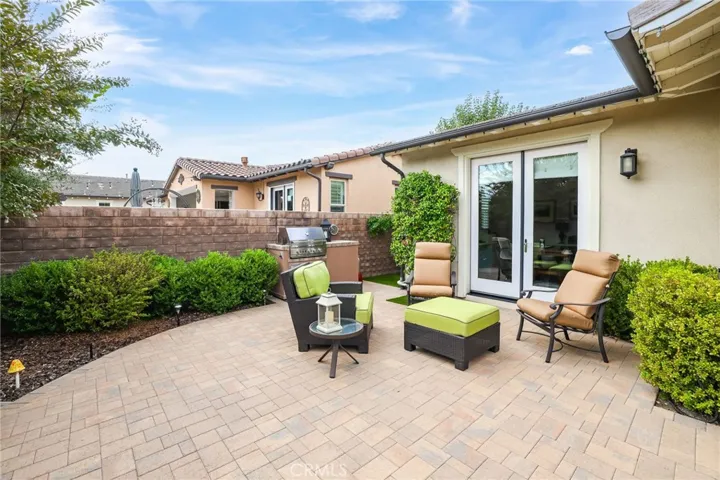 Large backyard patio with ample space for entertaining and relaxing.