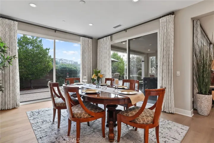 Dining space opening to an outdoor patio, ideal for indoor-outdoor living.