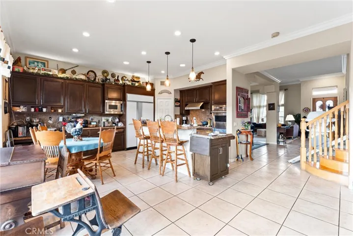 Large eat-in kitchen, breakfast bar seating, walk-in pantry, and tons of cabinet space!