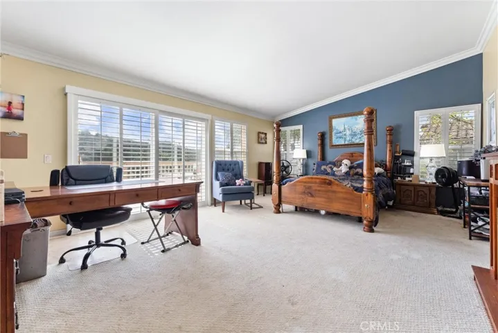 Primary Suite with vaulted ceilings, private deck and attached en suite!