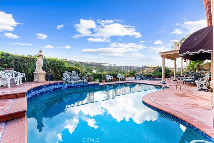 Pool with waterfall feature