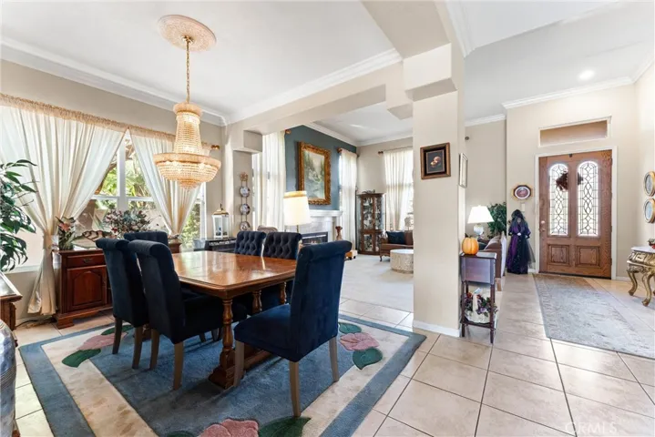 Formal dining room sits adjacent to the formal living room and is a perfect spot for holiday gatherings or special  events year round.