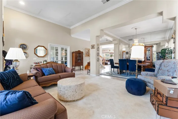 Formal living room with access to the home office or flex space located off the entryway!