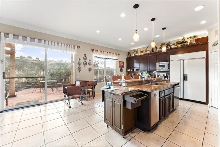 Large family kitchen sits off the family room and has great views of the backyard and surrounding hills.