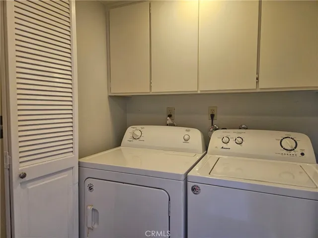laundry room with open doors