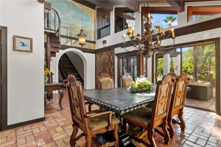 Details throughout.  Spanish hacienda touches from the wrap around patio, tiles, mural, iron & woodwork.   Indoor/outdoor living.