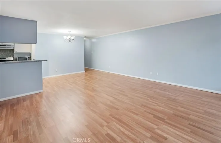 Living room with dining area and entry foyer