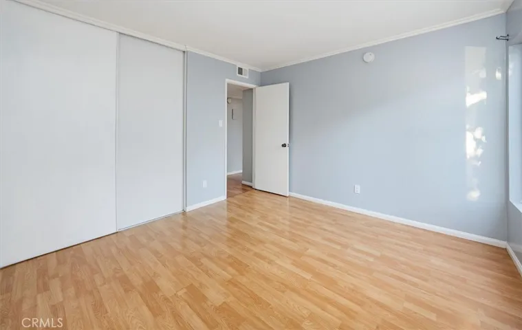 2nd bedroom view of closet and door