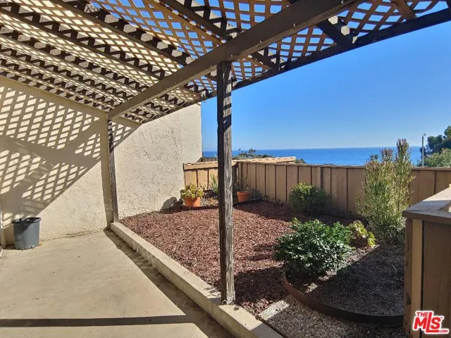 covered patio and yard