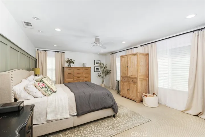 Primary w/ wall paneling and custom electrical