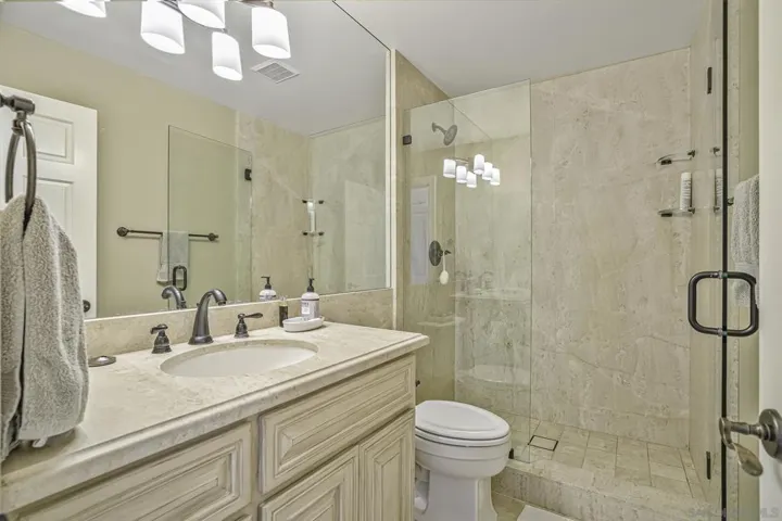 Another of the secondary bedroom's baths