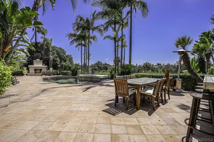 Great entertaining deck , dining area and pool and spa