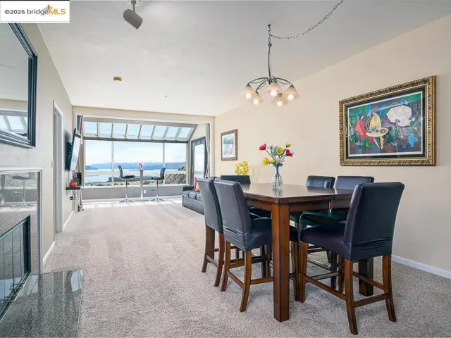 This photo is from 2021 when the home last sold. The home is in the same condition, though furnishings have changed and the front windows and frames have been upgraded to double-paned.