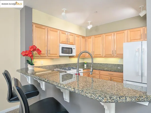 This photo is from 2021 when the home last sold. The home is in the same condition, though furnishings have changed and the front windows and frames have been upgraded to double-paned.