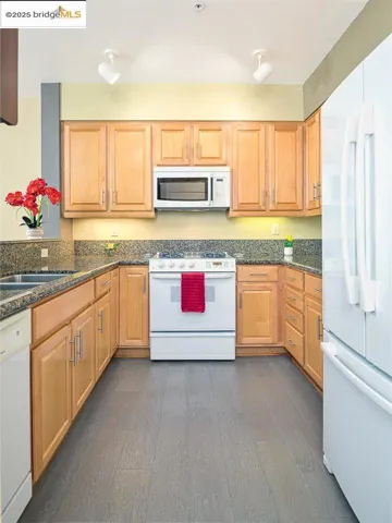 This photo is from 2021 when the home last sold. The home is in the same condition, though furnishings have changed and the front windows and frames have been upgraded to double-paned.